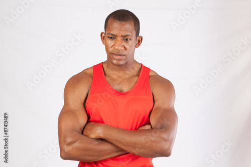 Strong black man with arms  crossed