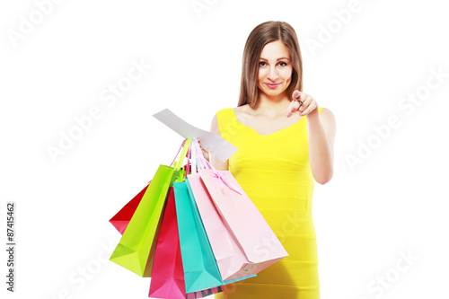 woman holding bags receipt