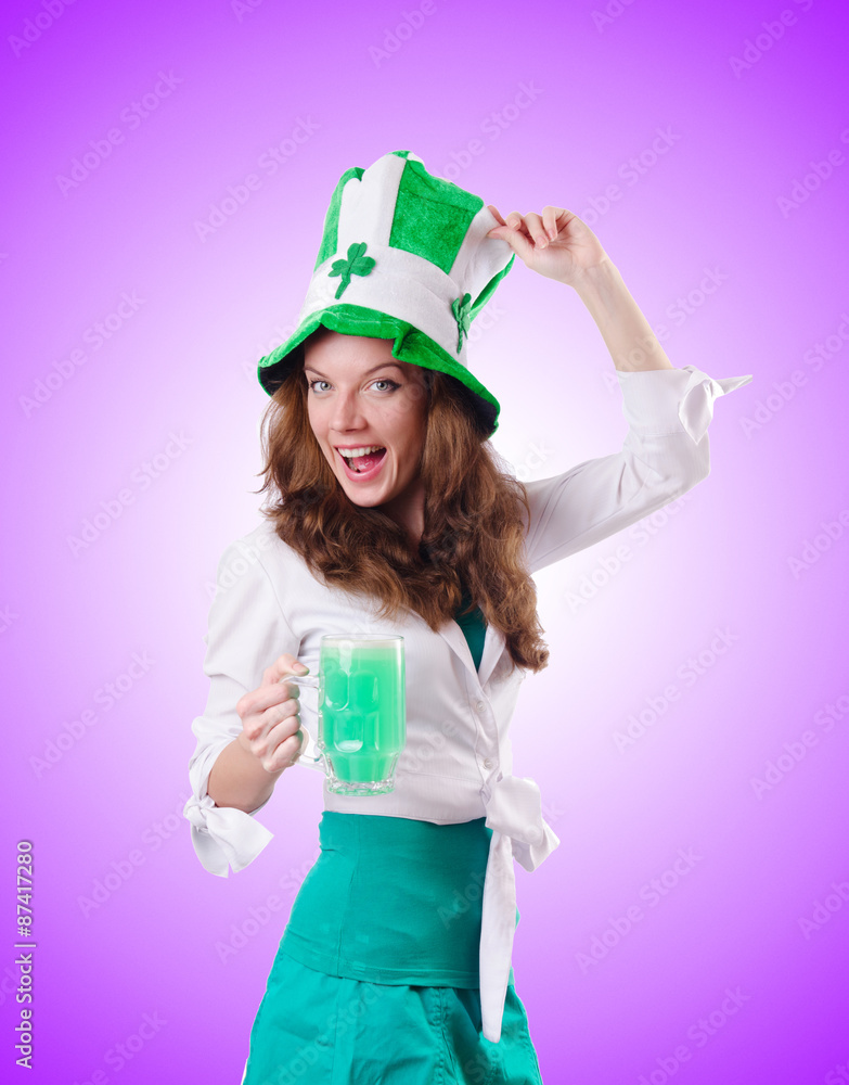 Young girl in saint patrick celebration concept Young girl in saint patrick celebration concept
