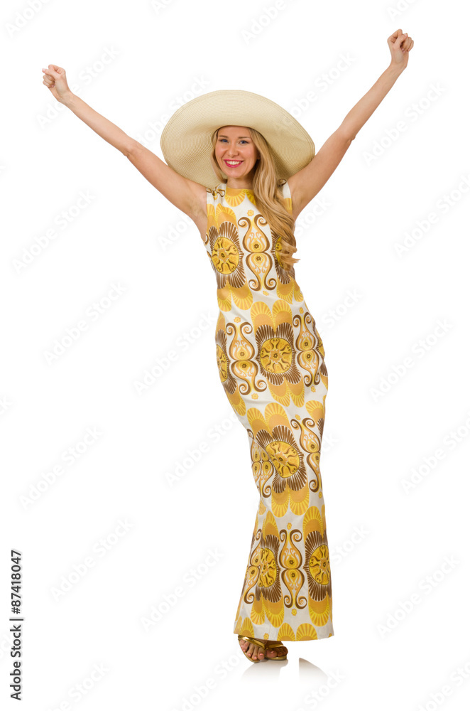 Young woman wearing hat and long summer dress isolated on white