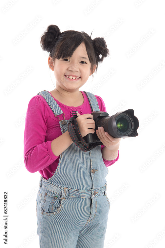 Cute asian girl holding camera on white backgroun Cute asian girl holding camera on white backgroun