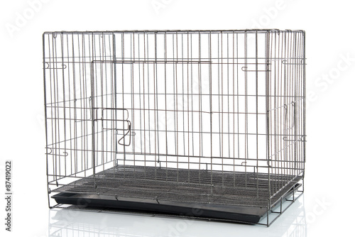 wire dog crate or animal cage photo