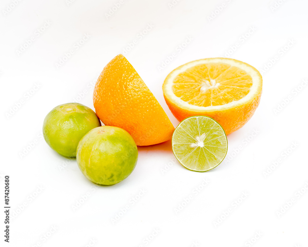 Slice of fresh orange and Slice of fresh lime on white backgroun Slice of fresh orange and Slice of fresh lime on white backgroun