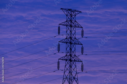 silhouette of high voltage electric tower