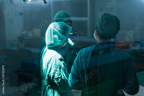 Surgery team speaking to each other at operating room