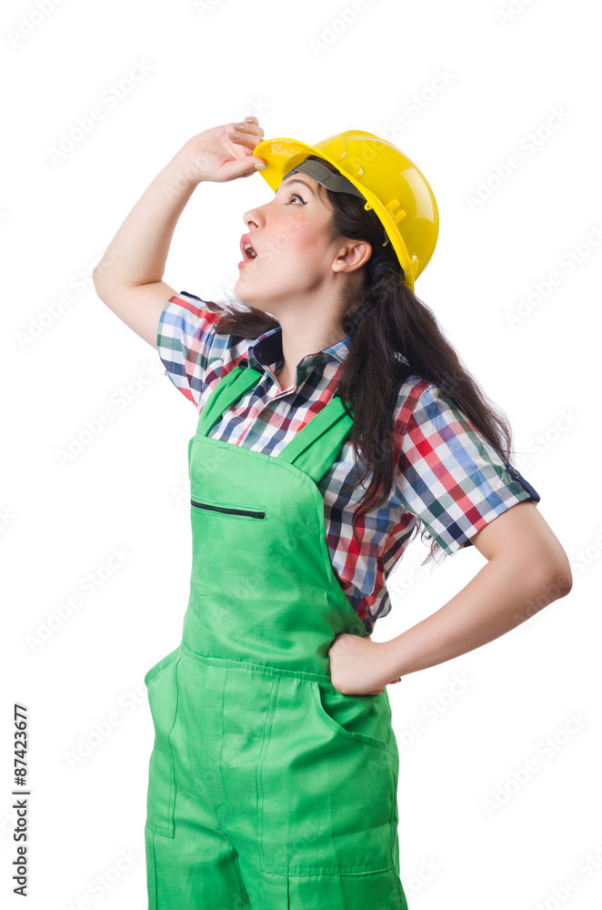 Female workman in green overalls isolated on white Female workman in green overalls isolated on white