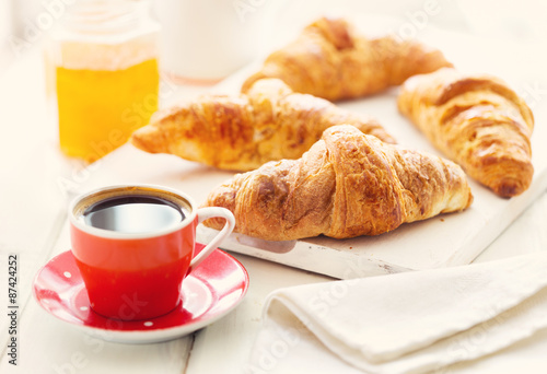 breakfast with croissants and coffee