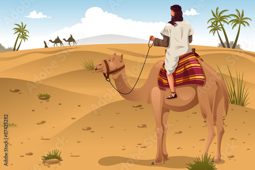Arabian Riding Camels on the Desert