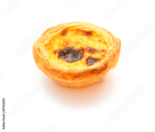 single portuguese egg tart on a white background photo