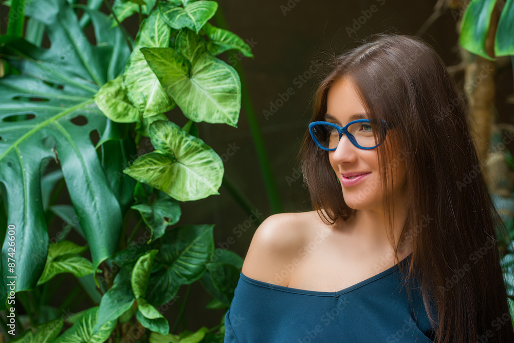 Beautiful girl near palm trees
Beautiful girl near palm trees