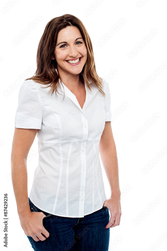 Smiling woman posing in style. Smiling woman posing in style.
