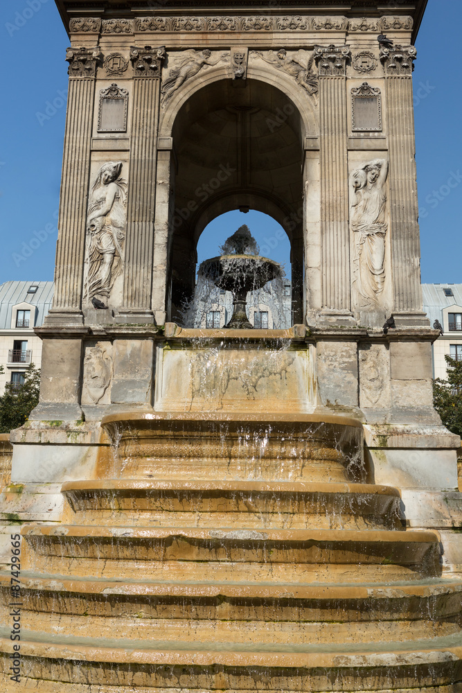  Paris - The Fontaine des Innocents is a monumental public fountain located on the place Joachim-du-Bellay in the Les Halles district in Paris, France