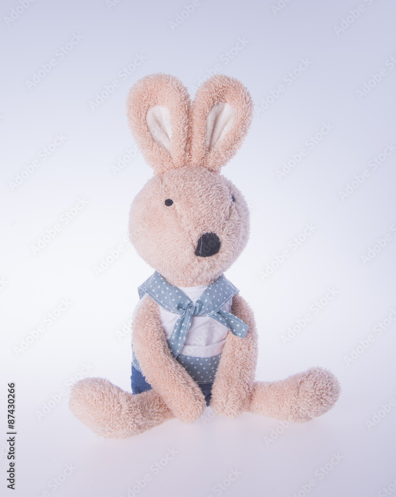 rabbit or bunny toy on a background. rabbit or bunny toy on a background.
