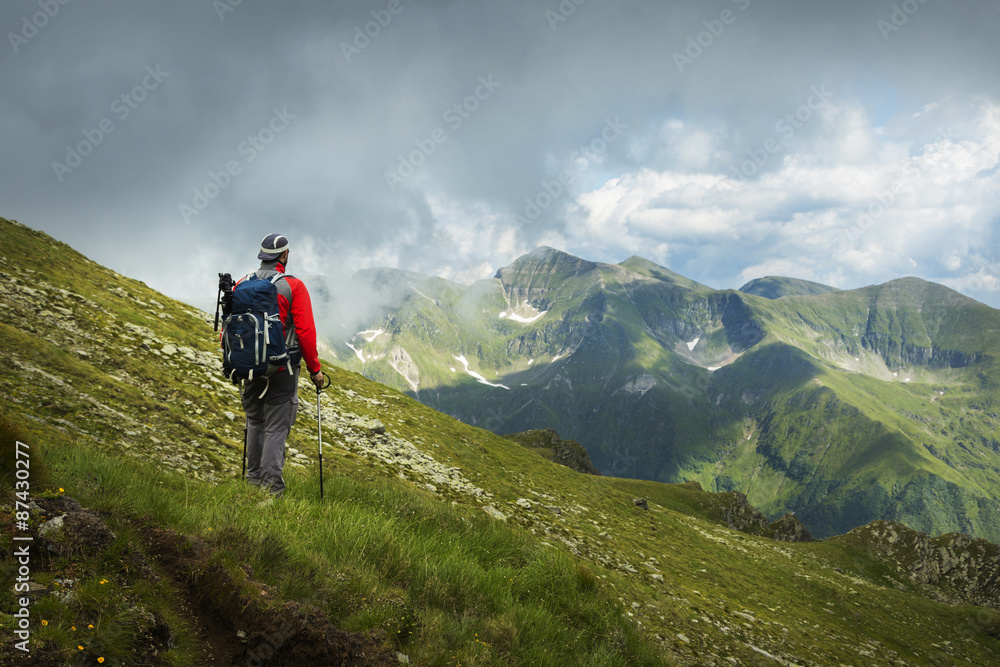 Backpacker admiring the landscape 