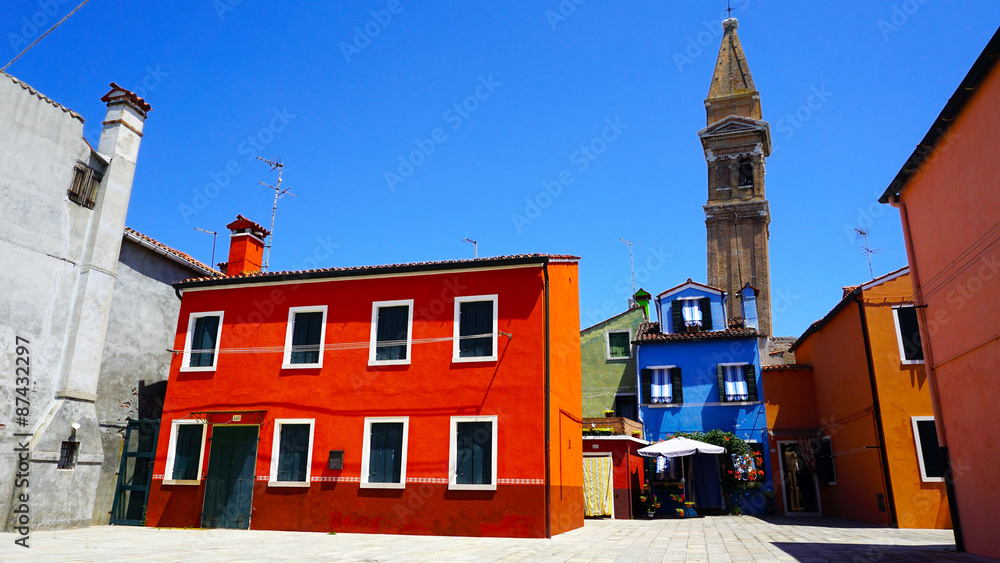 Burano colorful building architecture with church background