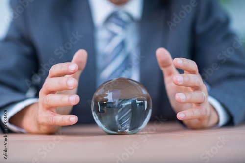 Slika na platnu Businessman forecasting a crystal ball