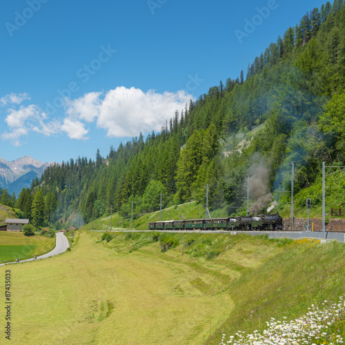 Journey by the historic steam train to Grisons, Swiss Alps