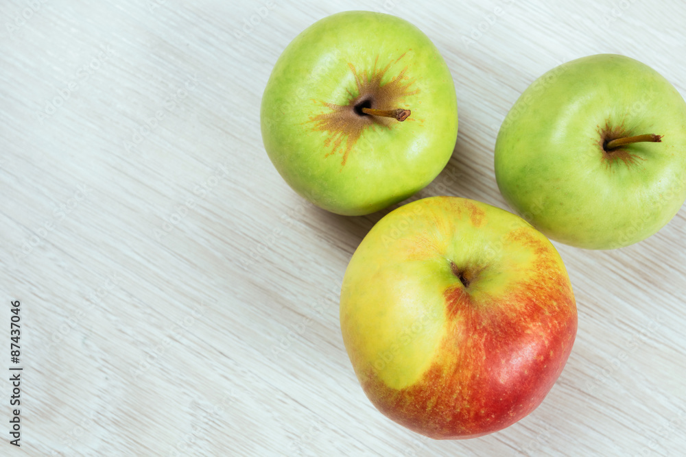 two green apples and red apple, top view two green apples and red apple, top view