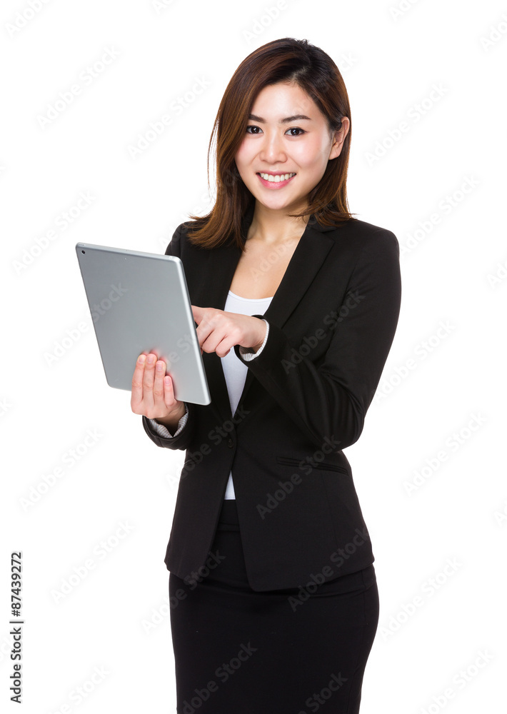 Asain businesswoman use of the tablet Asain businesswoman use of the tablet