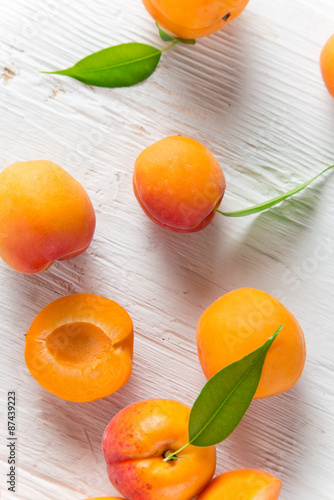 Fresh apricots on wooden ta...