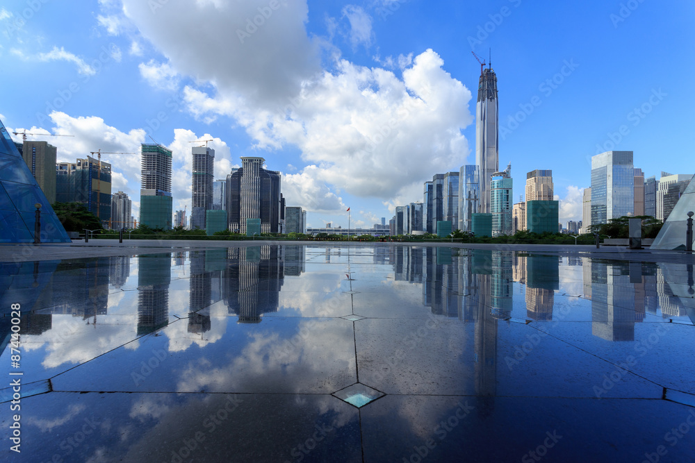Modern skyline and buildings with empty square floor