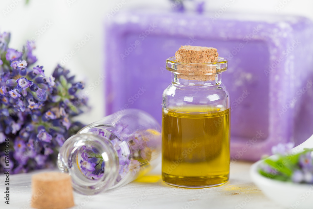 Wellness treatments with lavender flowers on wooden table. Spa still-life. Wellness treatments with lavender flowers on wooden table. Spa still-life.