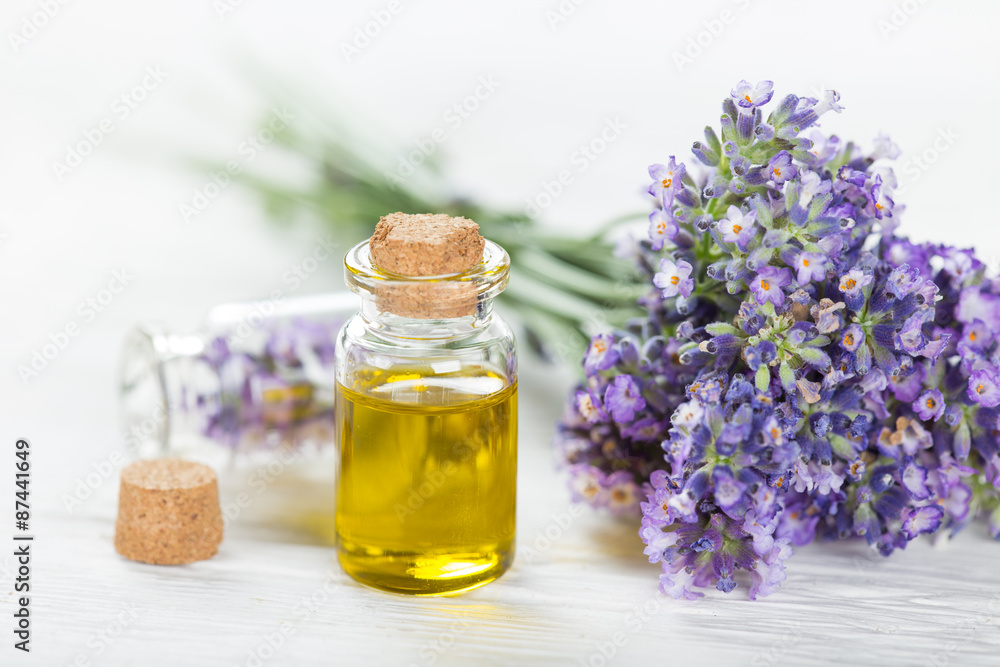 Wellness treatments with lavender flowers on wooden table. Spa still-life. Wellness treatments with lavender flowers on wooden table. Spa still-life.