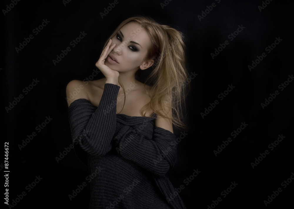Beautiful Sexy Blond Woman. Dark Background. Smokey Eyes Makeup Beautiful Sexy Blond Woman. Dark Background. Smokey Eyes Makeup