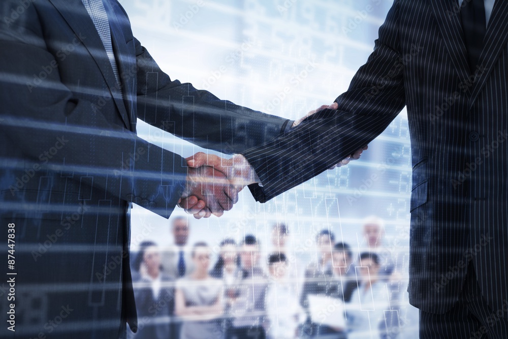 Composite image of handshake in agreement Composite image of handshake in agreement