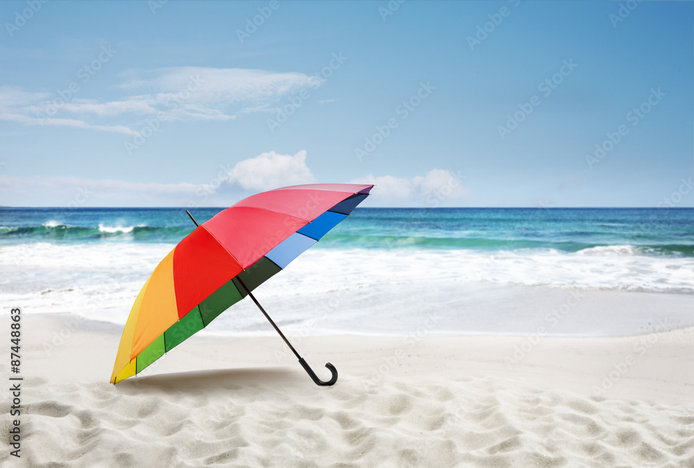 Schirm am Sandstrand