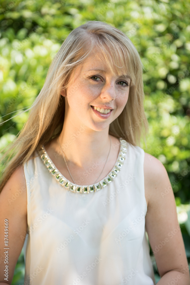 Portrait attractive young woman in the garden Portrait attractive young woman in the garden