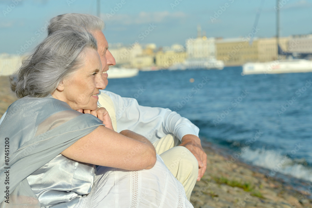 mature couple looking at town