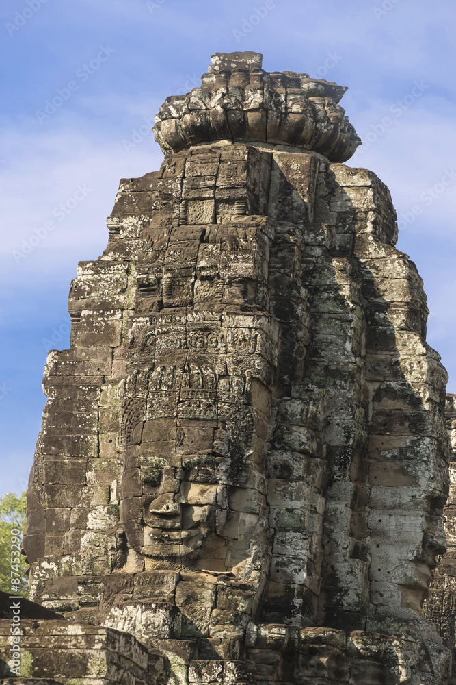 Ancient stone faces of king Jayavarman VII at The Bayon temple, Cambodia