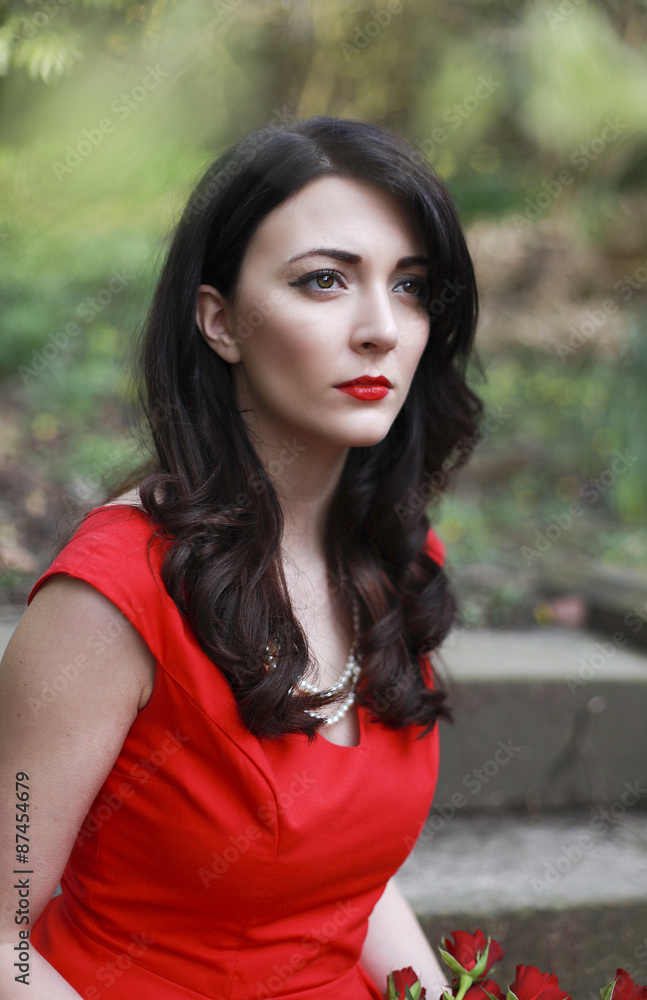 Beautiful woman wearing a red dress Beautiful woman wearing a red dress