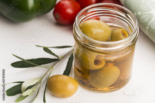 pickled olives and olive tree branch