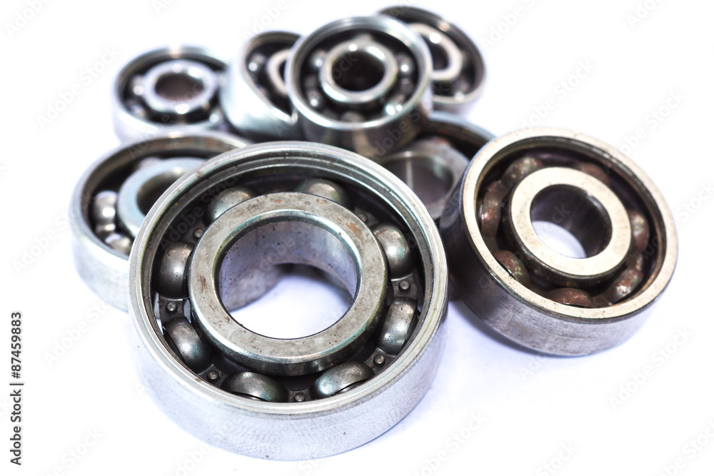 Old and dirty ball bearing, isolated on white background Old and dirty ball bearing, isolated on white background