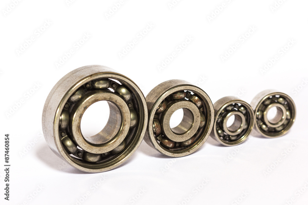 Old and dirty ball bearing, isolated on white background Old and dirty ball bearing, isolated on white background