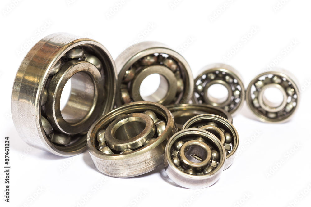 Old and dirty ball bearing, isolated on white background Old and dirty ball bearing, isolated on white background