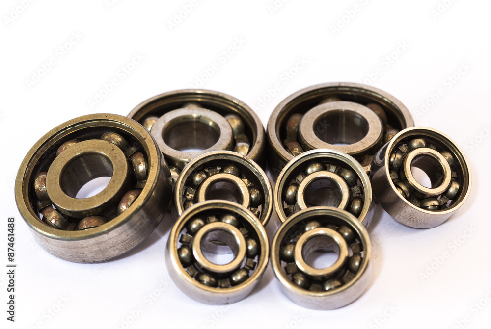 Old and dirty ball bearing, isolated on white background Old and dirty ball bearing, isolated on white background