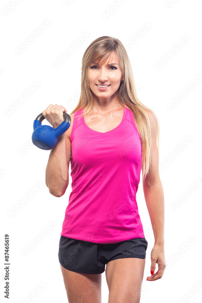 Fitness woman exercising crossfit holding kettlebell strength Fitness woman exercising crossfit holding kettlebell strength