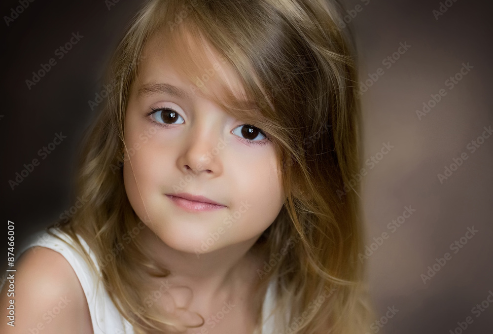 Glamour little girl's portrait. Beautiful child's face closeup. Glamour little girl's portrait. Beautiful child's face closeup.
