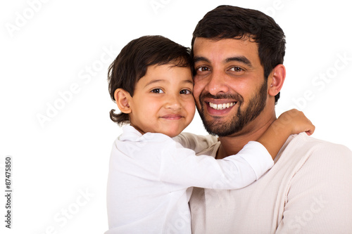 indian boy hugging his father © michaeljung