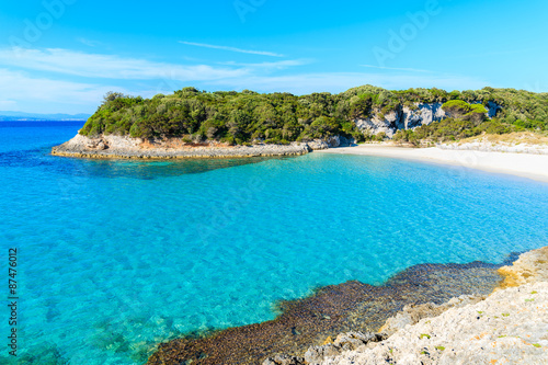 Turquoise sea water of Petit Sperone bay with beautiful beach, Corsica island, France
