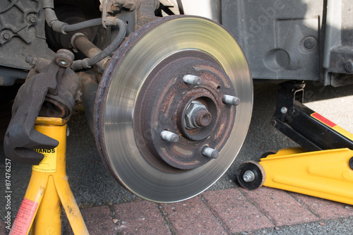 Worn Car Brake Disk brake caliper removed