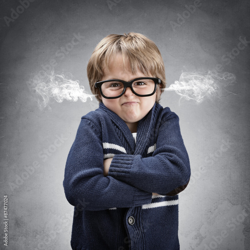 Konstfotografi Upset and angry boy venting steam from his ears