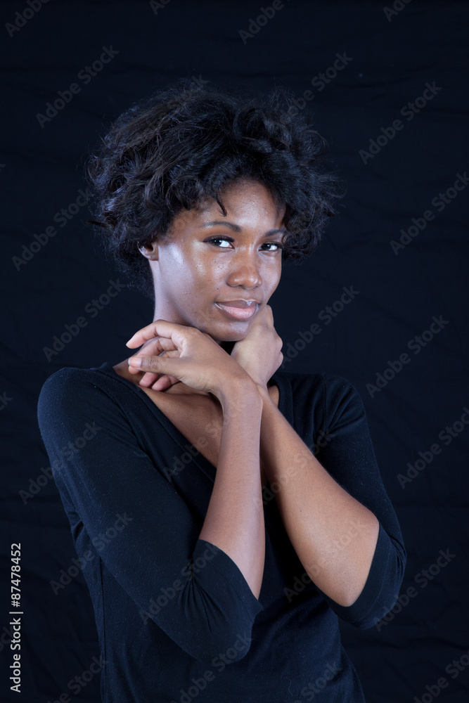 Pretty black woman looking thoughtful Pretty black woman looking thoughtful