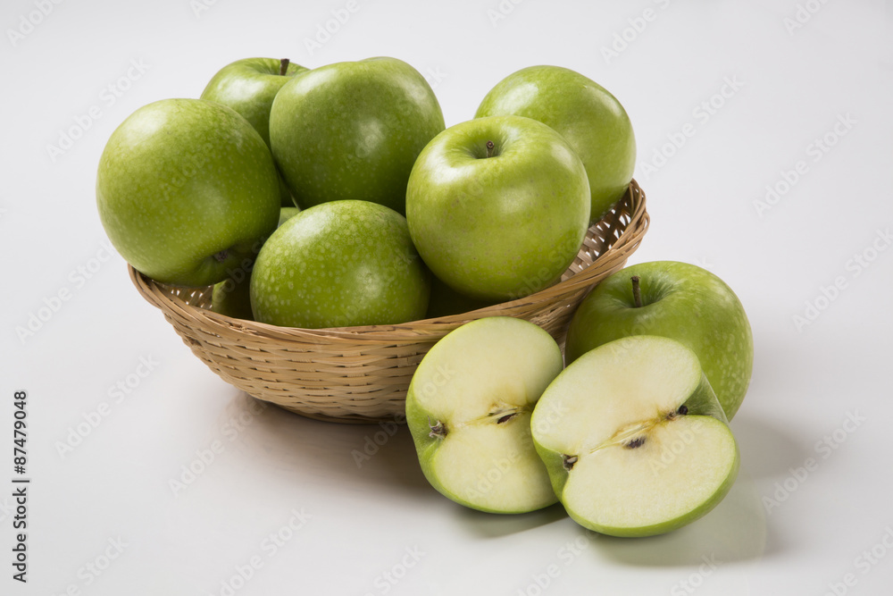 Some green apples on a white background Some green apples on a white background