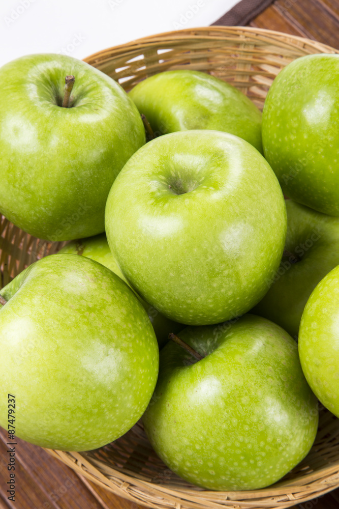 Some green apples on a white background Some green apples on a white background