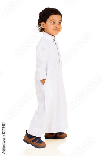 little Muslim boy walking