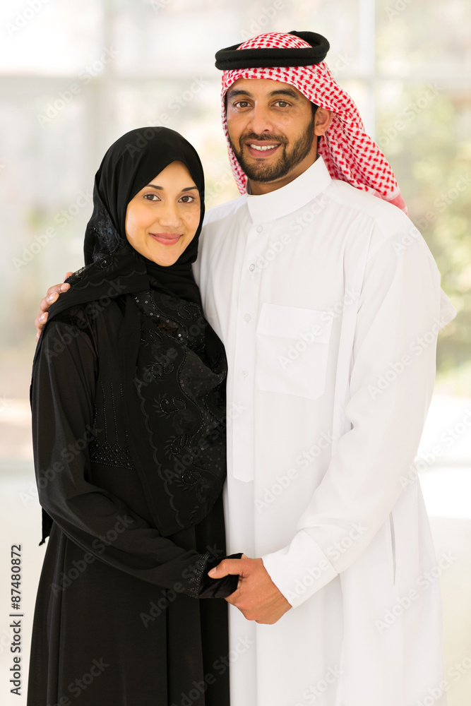 young muslim couple holding hands young muslim couple holding hands